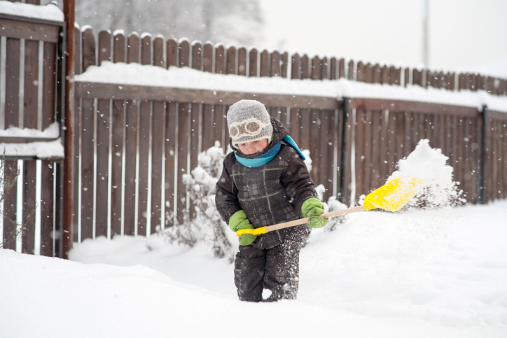 child shoveling